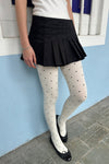 White with Black Polka Dots